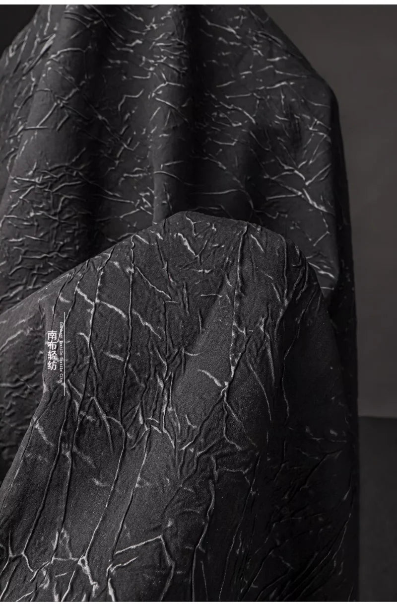Eco Pleat: Black Nylon-Rayon Fabric for Design Creations