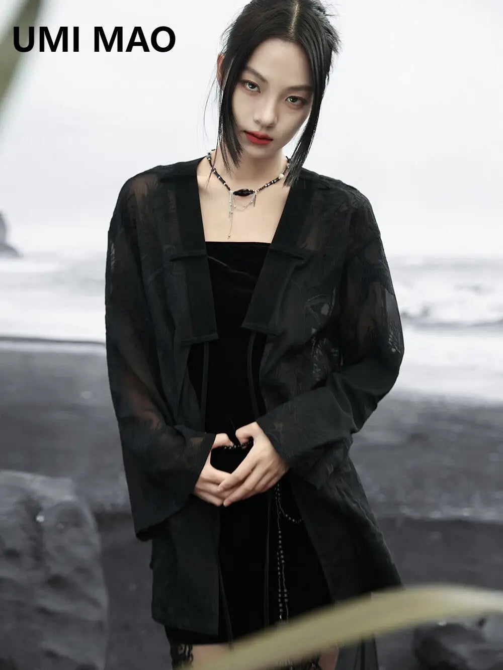Summer Elegance: Crane Emblem Black Jacket for Women